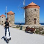 Explore the new town and the medieval town of Rhodes on scooters - 3 hours - The Sum Up