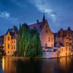 From Amsterdam: Day Trip to Bruges in Spanish - Guided Tour of Bruges: Highlights and Insights
