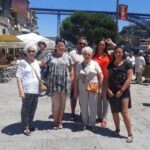 From Lisbon: Private Porto Tour with Wine Tasting in Gaia - Crossing the Dom Luís I Bridge