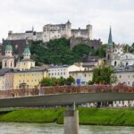From Vienna: Day Tour to Hallstatt and Salzburg with Boat Ride - What You Can Expect on the Day