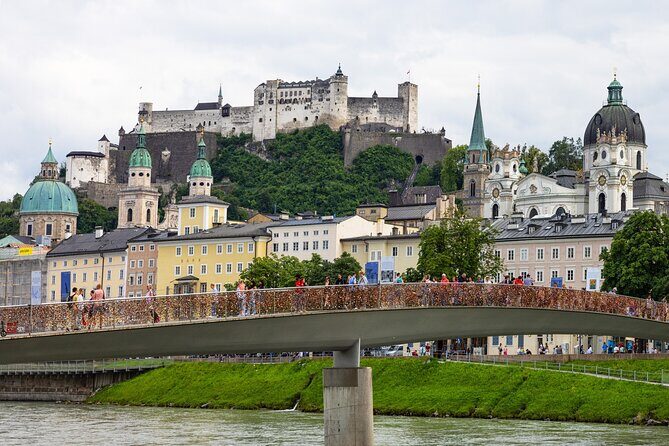 From Vienna: Day Tour to Hallstatt and Salzburg with Boat Ride - What You Can Expect on the Day