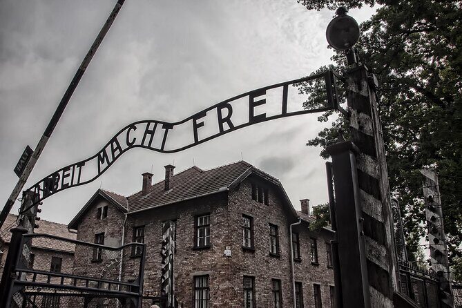 From Warsaw: Auschwitz-Birkenau Tour with Premium Train Transportation - Exploring Auschwitz I and Auschwitz II-Birkenau
