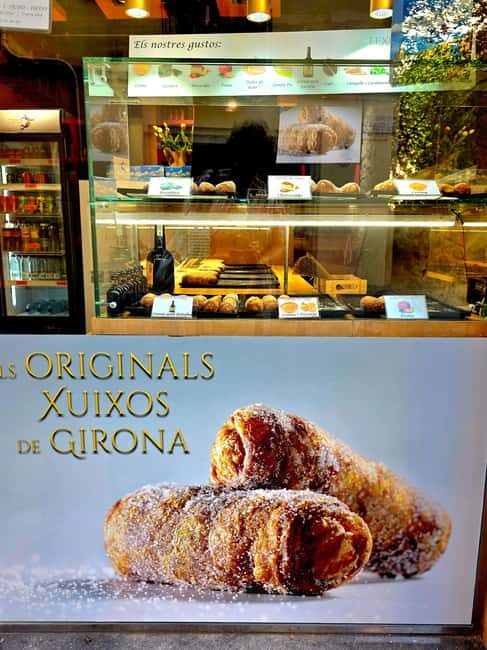 Girona: Medieval Food Tour with Local Guide - Visiting the Local Market and Food Shops