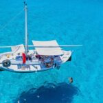 Guided day by boat in Carloforte with snorkelling and aperitif - The Experience on Board