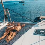 Half-Day Exclusive Catamaran Cruise in Santorini with Meal and Open Bar - The Sum Up