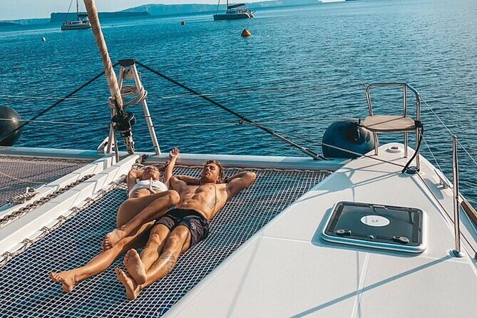 Half-Day Exclusive Catamaran Cruise in Santorini with Meal and Open Bar - The Sum Up