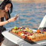 Majorca: Dinner aboard a private catamaran with snorkeling and paddle surfing - What You Can Expect: The Details