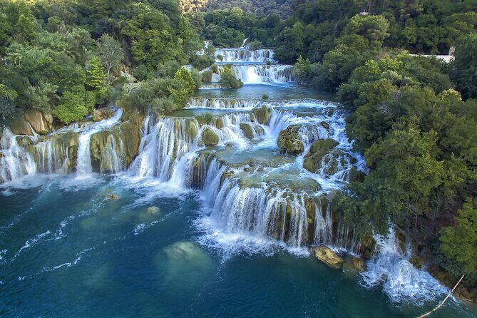Private Krka Waterfalls Tour from Split with stop in Trogir - Authentic Experiences and Insights from Reviewers