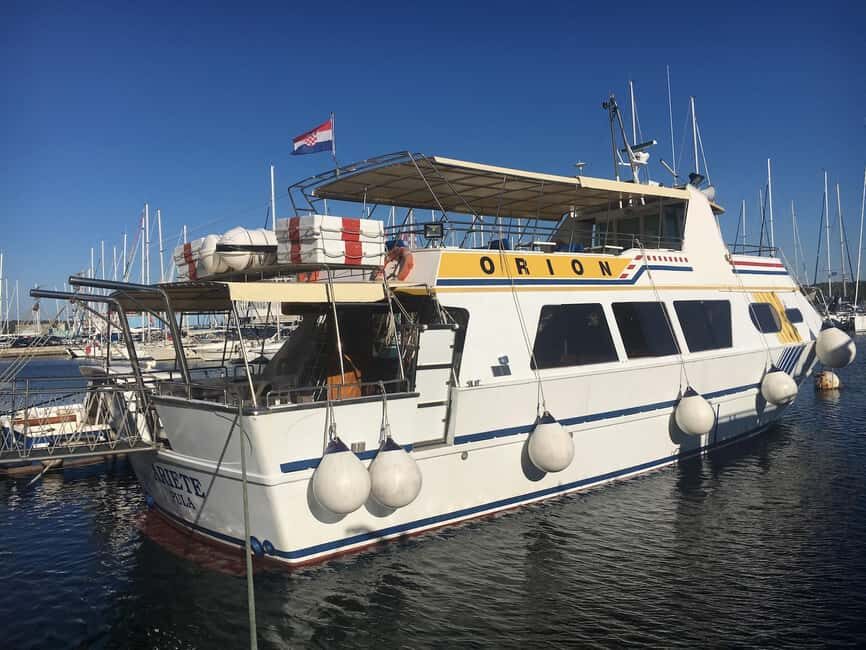 Pula: Dolphin Watching Sunset Cruise with Dinner & Drinks - A Closer Look at the Tour Experience