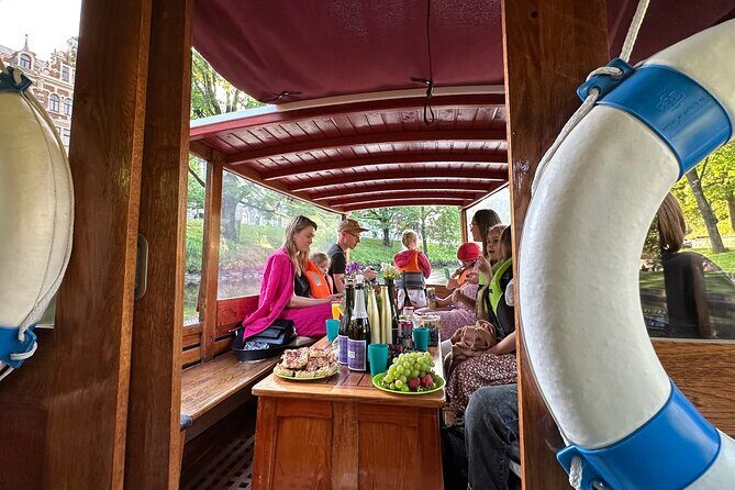 Riga: Evening or Sunset Boat Tour with Drink and Audio Guide - Who Will Love This Tour?