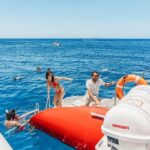 Santorini: Catamaran Tour with BBQ Dinner, Drinks, and Music - The Itinerary: A Day on the Water