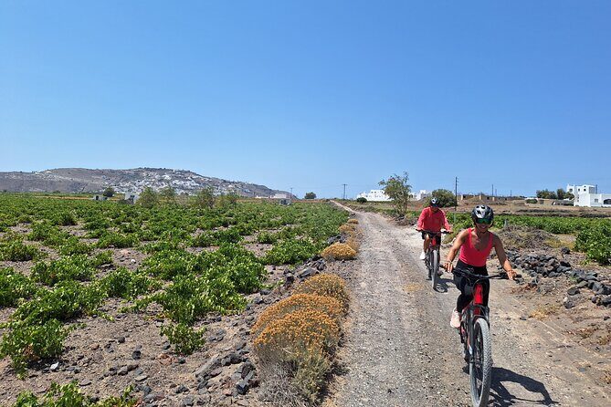 Santorini e-bike sunset tour experience - Sunset Over Megalochori and the Final Dip into the Sea