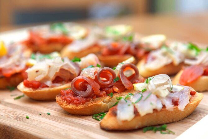 Tasty Tapas & Drinks Tour with a Rooftop Included - Authentic Experiences From the Reviews