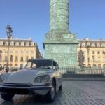 The Essentials of Paris in a Classic Open Top Car Citroën DS - The Sum Up