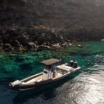 Unique Half-Day Private Motor Boat Cruise in Santorini - The Onboard Experience and Amenities