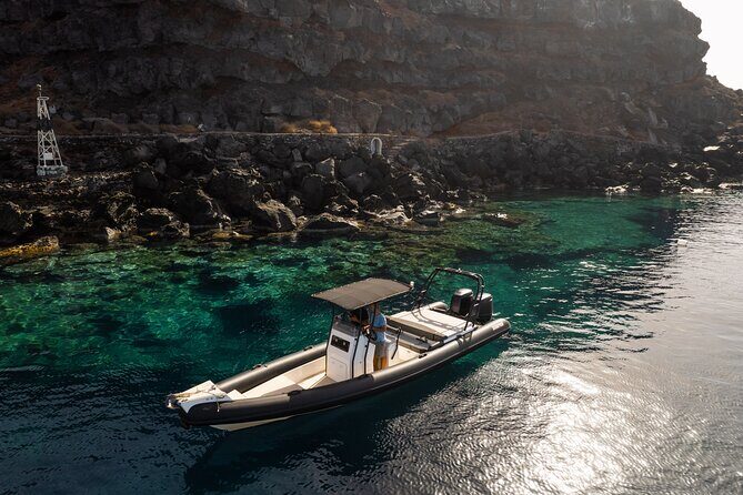 Unique Half-Day Private Motor Boat Cruise in Santorini - The Onboard Experience and Amenities