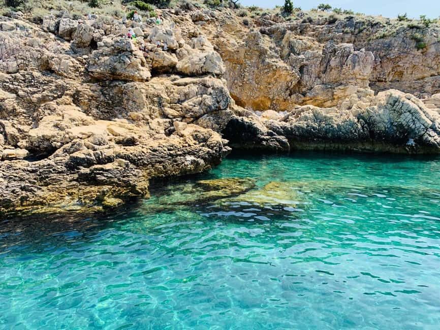 Cruise at Golden Beach and Blue cave, explore island Plavnik - The Itinerary: A Day of Natural Wonders