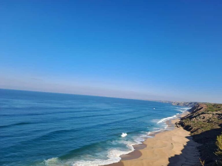 Ericeira: Surf Guide Tour to Nazaré with Transportation - Transportation & Group Size