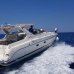 Fira: Private Sunset Cruise with BBQ, Drinks and Hot Springs - Setting sail from Vlychada Marina