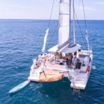 Gran Canaria: Catamaran tour with lunch along unspoiled beaches - Authentic Experiences and Practical Details