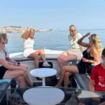 Lisbon: City Boat Cruise Daytime/Sunset/Night with Champagne - The Sum Up