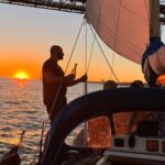 Lisbon: Sailboat Sunset Tour with a Drink - The Onboard Experience: Drinks, Snacks, and Atmosphere