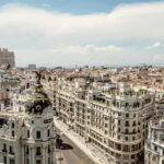 Madrid: Private Highlights Walking Tour with Rooftop Stop - Discovering Landmark Highlights