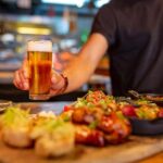 Madrid: Tapas & Wine Tour with Visit to a Rooftop - Guided Experience and Group Dynamics