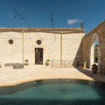 Nature and relaxation by the pool at Baglio Passofondo Estates - What to Expect at Baglio Passofondo Estates