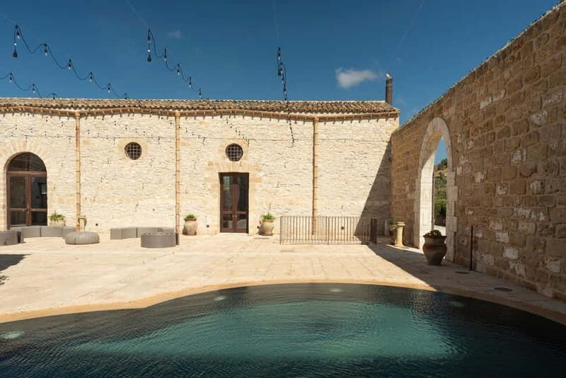 Nature and relaxation by the pool at Baglio Passofondo Estates - What to Expect at Baglio Passofondo Estates