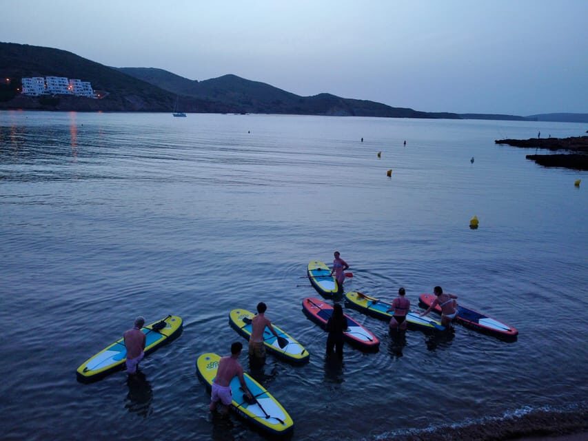 Paddle Surf with Led lights at sunset in Menorca - What to Expect from the Sunset Paddle Experience