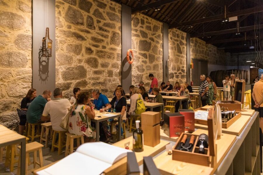 Porto: Guided Tour and Tasting of 3 Port Wines at Poças - The Guide and Atmosphere