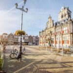 Rotterdam, Hague & Delft Private Tour from Amsterdam by Car - The Charm of Delft: Medieval Roots and Handcrafted Ceramics