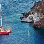 Santorini: Cruise Catamaran with BBQ & Drinks Day or Sunset - The Sum Up