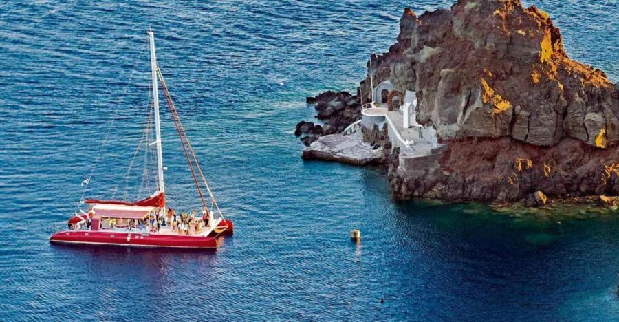 Santorini: Cruise Catamaran with BBQ & Drinks Day or Sunset - The Sum Up
