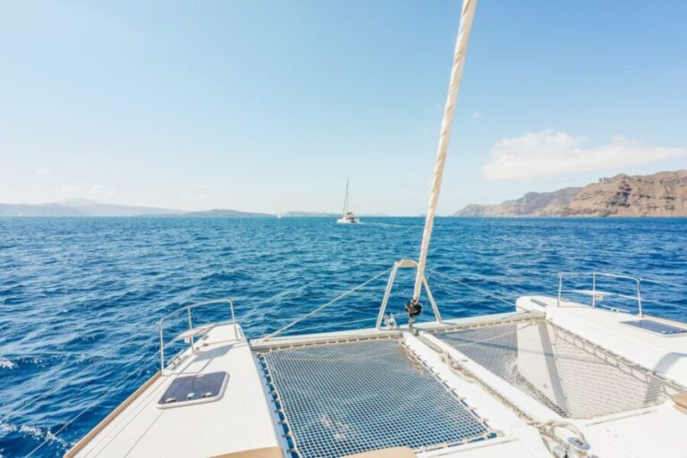 Santorini: Luxury Catamaran Day Trip with Meal and Open Bar - Who Will Love This Tour?