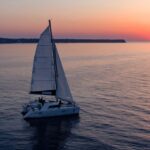 Santorini: Luxury Sunset Cruise with Dinner & Open Bar - The Sum Up