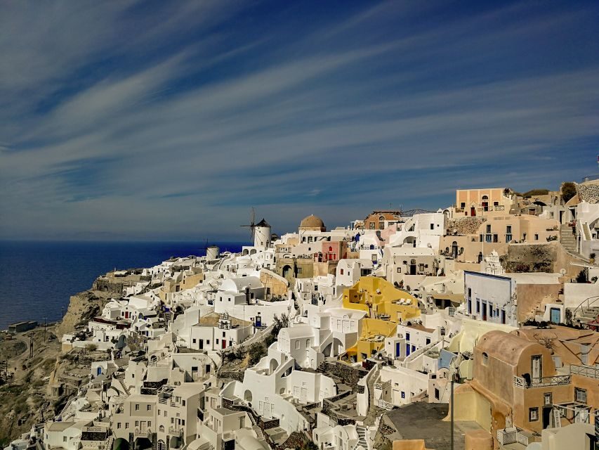 Santorini: Private Sunset Tour with Wine Tasting and Dinner - Wine Tasting at Santo Wines Winery
