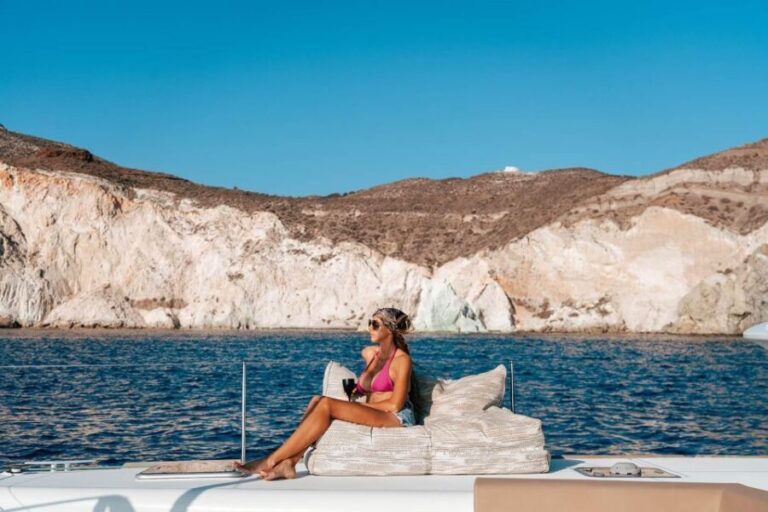 Santorini: Sunset Sailing Cruise, with Dinner and Drinks - The Itinerary: A Day of Scenic Highlights and Refreshing Swims