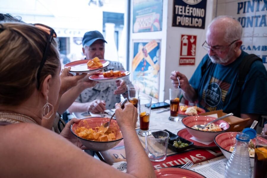 Seville Adventure: Historic Walking Tour & Traditional Tapas - Majestic Seville Cathedral and Alcázar