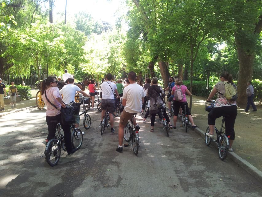 Seville: Relaxing Electric Bike tour with Tour Guide - The Experience in Detail: Stops and Highlights