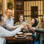 Seville: Triana Neighborhood Evening Tapas Tour - Starting Point and Atmosphere