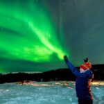 Tromsø: Northern Lights by Minibus with Photos & bodysuits - Authentic Arctic Experience