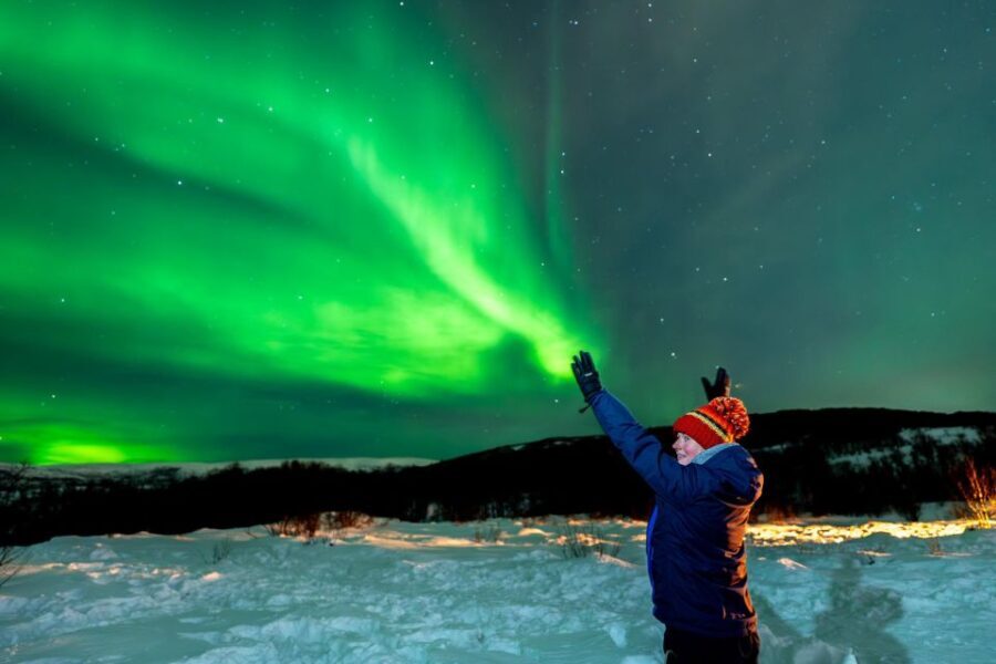 Tromsø: Northern Lights by Minibus with Photos & bodysuits - Authentic Arctic Experience
