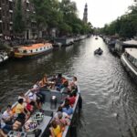 Visit Amsterdam by Boat with a French Guide (french) - Authentic Insights from Reviews