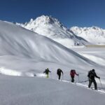 Vorarlberg: Easy ski tour in the Silvretta including mountain railway ticket - Skill Development in Peaceful High Altitude Terrain