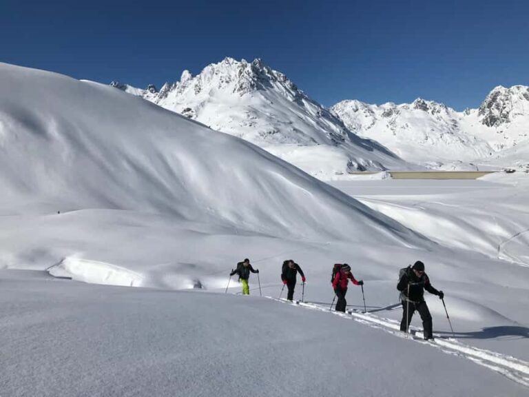 Vorarlberg: Easy ski tour in the Silvretta including mountain railway ticket - Skill Development in Peaceful High Altitude Terrain