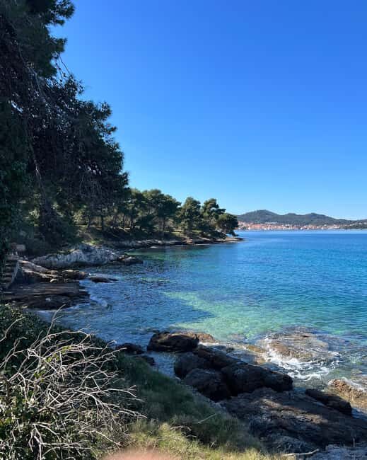 Zadar: Islands Speedboat Tour & Blue Bay Swim with Drinks - Exploring Oljak: The Smallest Inhabited Island