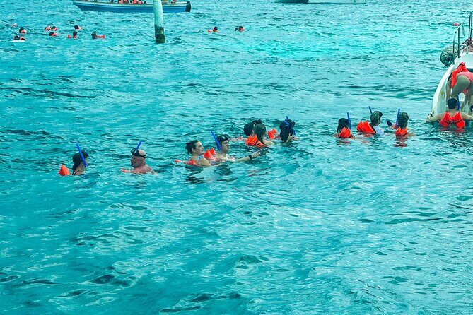 Adults-Only Catamaran Fun from Cancun - Isla Mujeres and Downtown Exploration