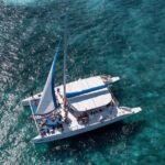 Adults-Only Sunset Catamaran Cruise to Isla Mujeres - The Experience in Context
